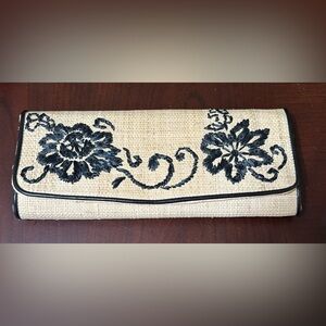 Straw clutch purse with black flower decoration like new really sweet!